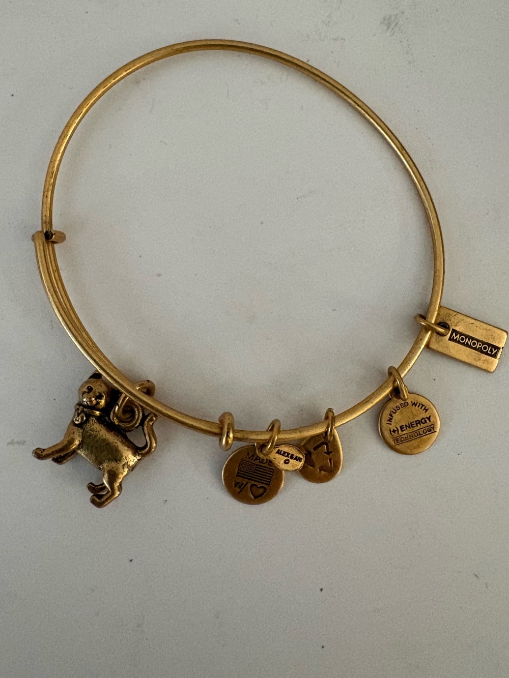 Alex and Ani Gold Monopoly Cat Charm Bangle Bracelet.